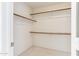 Walk-in closet with ample shelving and carpet at 3417 W Abraham Ln, Phoenix, AZ 85027