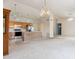 Bright kitchen with a functional island, ample cabinet space, and easy access to the living area at 3417 W Abraham Ln, Phoenix, AZ 85027