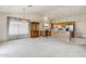 Open-concept living space connecting the living area to the kitchen for seamless entertaining at 3417 W Abraham Ln, Phoenix, AZ 85027