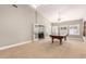 A game room with a ping pong table and access to the dining area with plenty of natural light at 3528 E Decatur St, Mesa, AZ 85213