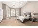 Bright bedroom with vaulted ceiling, lots of light from many windows, and neutral finishes at 3528 E Decatur St, Mesa, AZ 85213