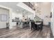 Spacious living space combining kitchen, dining, and staircase, offering a seamless flow and modern design at 3855 S Mcqueen Rd # 24, Chandler, AZ 85286