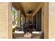 Charming covered patio with a ceiling fan and comfortable seating, perfect for relaxing outdoors at 3855 S Mcqueen Rd # 24, Chandler, AZ 85286