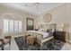 Serene bedroom featuring neutral colors, decorative accents, and natural light at 4055 N Recker Rd # 82, Mesa, AZ 85215
