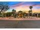 Charming single-story home showcasing manicured desert landscaping, great curb appeal, and a welcoming entrance at 4055 N Recker Rd # 82, Mesa, AZ 85215
