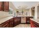 Well-appointed kitchen with granite countertops, stainless steel appliances, and a breakfast bar at 4055 N Recker Rd # 82, Mesa, AZ 85215