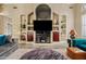 Spacious living room with built-in shelving, entertainment center and cozy seating area at 4055 N Recker Rd # 82, Mesa, AZ 85215