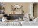Inviting living room featuring designer furnishings, a decorative mirror, and neutral tones at 4055 N Recker Rd # 82, Mesa, AZ 85215