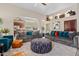 Open concept living room with vaulted ceilings, comfortable seating, and natural light at 4055 N Recker Rd # 82, Mesa, AZ 85215