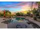 Beautiful outdoor pool and patio area perfect for entertaining featuring desert landscaping and lounge chairs at 4055 N Recker Rd # 82, Mesa, AZ 85215