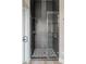 Contemporary shower featuring modern tile, glass door, and updated fixtures at 4055 N Recker Rd # 82, Mesa, AZ 85215