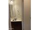 Bathroom featuring a vanity with chrome fixtures and a mirror at 4219 N 69Th N Ln # 1319, Phoenix, AZ 85033