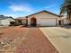 Charming single-story home featuring a well-maintained yard and an attached two-car garage at 4247 N 101St Ave, Phoenix, AZ 85037