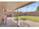 Relaxing backyard with covered patio, swing, barbecue grill, and picnic table at 4559 E Sierrita Rd, San Tan Valley, AZ 85143