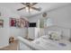 Charming bedroom featuring a cozy bed, dresser, and closet with custom shelving at 4559 E Sierrita Rd, San Tan Valley, AZ 85143