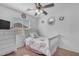 Delightful bedroom with a white bed frame and lots of natural light at 4559 E Sierrita Rd, San Tan Valley, AZ 85143