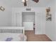 Bright bedroom featuring an open layout leading to loft space and decorative wall accents at 4559 E Sierrita Rd, San Tan Valley, AZ 85143