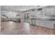 Bright, open living space featuring kitchen, dining, and living area with neutral decor at 4559 E Sierrita Rd, San Tan Valley, AZ 85143