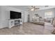Bright and open living room featuring a ceiling fan and decorative accents at 4559 E Sierrita Rd, San Tan Valley, AZ 85143