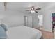 Bright and airy main bedroom showing access to bathroom and closet at 4559 E Sierrita Rd, San Tan Valley, AZ 85143