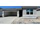 Charming single-story home featuring a convenient attached two-car garage and a modern design at 5016 S 106Th Ln, Tolleson, AZ 85353