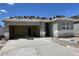 New construction single-Gathering home featuring an attached two-car garage and contemporary design at 5016 S 106Th Ln, Tolleson, AZ 85353