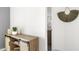 Hallway with wood-style cabinet and modern decor to bring warmth to any home at 5016 S 106Th Ln, Tolleson, AZ 85353