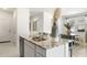 Bright kitchen with an island and granite countertops, perfect for cooking and entertaining at 5016 S 106Th Ln, Tolleson, AZ 85353