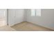 This cozy bedroom has neutral carpet, bright natural light and large closet at 5053 S 252Nd Ave, Buckeye, AZ 85326