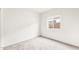 Bright bedroom with carpet and a window at 5091 S 251St Dr, Buckeye, AZ 85326