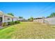 Spacious backyard with lush grass and block wall for privacy at 512 W Seldon Ln, Phoenix, AZ 85021