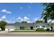 Charming single-story home with a well-manicured lawn and a classic white exterior at 512 W Seldon Ln, Phoenix, AZ 85021
