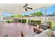Relaxing outdoor patio with BBQ grill, seating, and a view of the landscaped backyard at 512 W Seldon Ln, Phoenix, AZ 85021