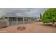 Charming single-story home featuring mature trees, an awning covered porch, and low-maintenance landscaping at 5401 E Cicero St, Mesa, AZ 85205