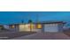 Charming single-story home featuring a well-maintained front yard and attached garage, inviting curb appeal at 5401 E Cicero St, Mesa, AZ 85205