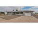 Charming single-story home featuring a well-maintained front yard and attached garage at 5401 E Cicero St, Mesa, AZ 85205