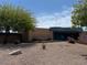 View of the Chaparral Aquatic Center with a brick facade and mature landscaping at 5564 N 77Th Pl, Scottsdale, AZ 85250