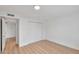 Bright, carpet-free bedroom with closet, door and base moulding at 5564 N 77Th Pl, Scottsdale, AZ 85250