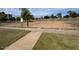 Outdoor sand volleyball court in a green park setting, perfect for recreation at 5564 N 77Th Pl, Scottsdale, AZ 85250