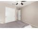 Bright bedroom with a closet, neutral walls, and plush carpet for a cozy feel at 6539 W Briles Rd, Phoenix, AZ 85083