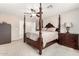 Bedroom featuring a bed, ceiling fan, carpet, and neutral walls at 6539 W Briles Rd, Phoenix, AZ 85083
