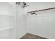 Walk in closet with carpet, neutral walls, and shelving at 6539 W Briles Rd, Phoenix, AZ 85083