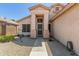 Welcoming home boasts desert landscaping, covered entrance and security door for added peace of mind at 6539 W Briles Rd, Phoenix, AZ 85083