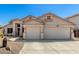 Attractive single-Gathering home featuring a spacious two-car garage and drought-tolerant front yard at 6539 W Briles Rd, Phoenix, AZ 85083