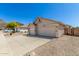 Inviting single story home with two-car garage and low maintenance desert landscaping at 6539 W Briles Rd, Phoenix, AZ 85083