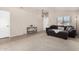 Living room showcases a sofa and stylish decor in a neutrally decorated, naturally lit space at 6539 W Briles Rd, Phoenix, AZ 85083