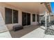 Large covered patio for outdoor living, with a barbecue, seating, and desert views at 6539 W Briles Rd, Phoenix, AZ 85083