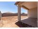 Covered patio with concrete floors offering an outdoor living space and views of the backyard at 7417 E Hackamore Ln, San Tan Valley, AZ 85143