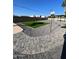 Backyard with pavers, artificial turf, pea gravel and a view of the cabana at 7637 E Akron St, Mesa, AZ 85207