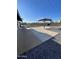 Backyard cabana, concrete patio and modern minimalist desert landscape at 7637 E Akron St, Mesa, AZ 85207
